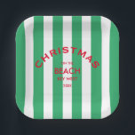 Assiettes En Carton Noël Sur La Plage Custom Green Cabana Stripe<br><div class="desc">Ces plaques en papier sont parfaites pour vos fêtes de Noël, fêtes et rassemblement sur la plage... Bandes de cabane vert avec logo de plage personnalisé rouge. Personnalisez avec l'emplacement de la plage et l'année. L'ajout parfait à vos réunions de Noël ! Accessoires correspondants disponibles dans la collection Christmas On...</div>