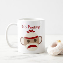 Aucune tasse boudante de singe de chaussette de