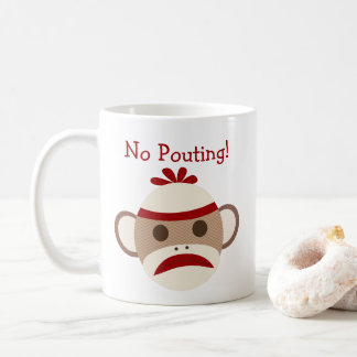 Aucune tasse boudante de singe de chaussette de
