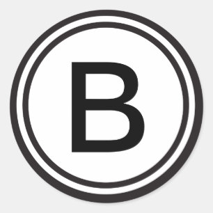 Autocollant décoré d'un monogramme initial fait