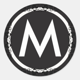 Autocollant initial de lettres noires et blanches