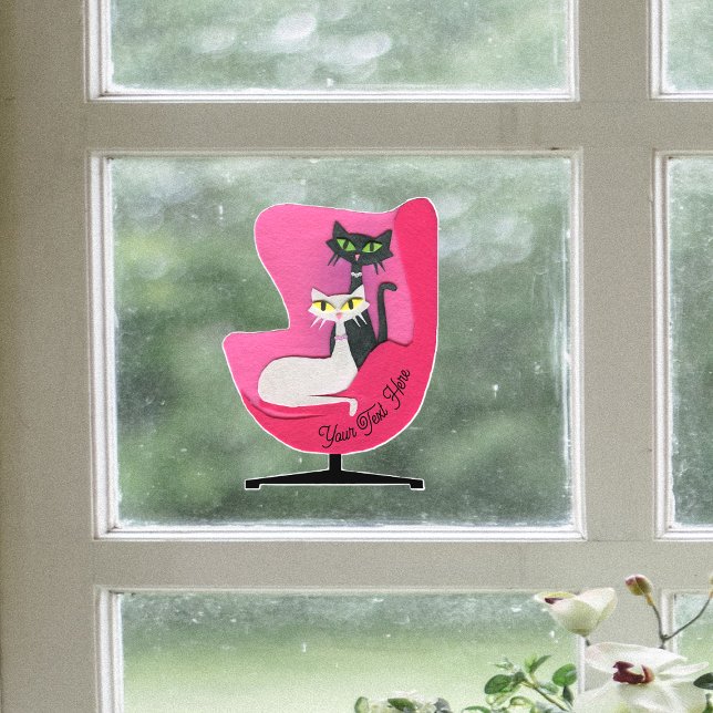 Autocollant Pour Fenêtre Chats Atomiques Chic et Jolis dans une Chaise Rose (Two class pretty atomic cats in mid centruy pink chair on window cling decoration.)
