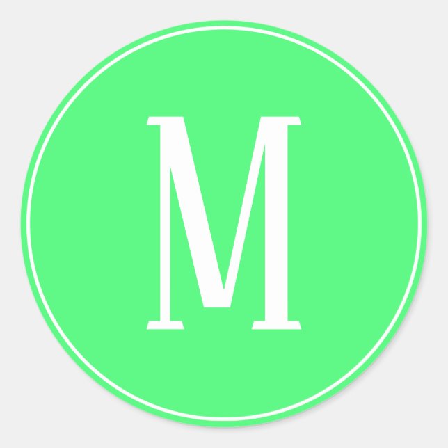 Autocollant rond blanc sur fond vert clair avec mo (Devant)