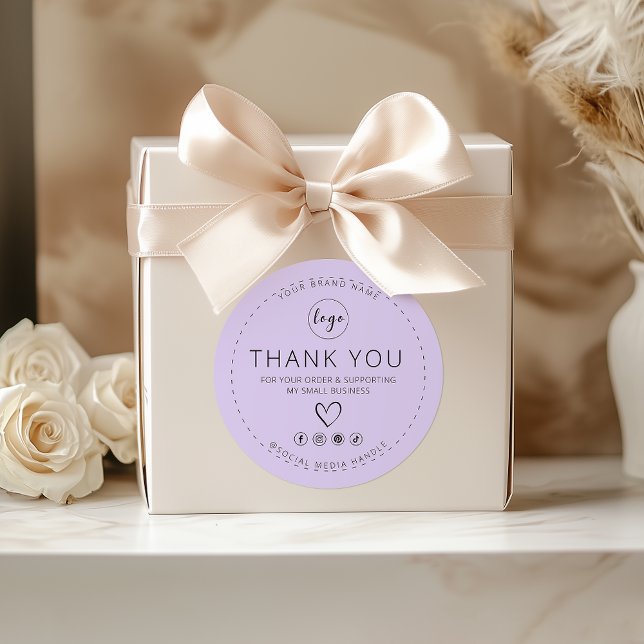 Autocollant violet avec Merci de logo pour votre c (Purple Sticker with Logo Thank you for your order)