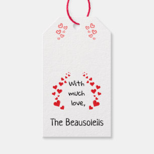 Avec une étiquette de cadeau beaucoup d'amour (peu