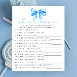 Baby shower avec un ruban bleu Qui connaît le mieu