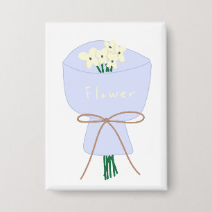 Badge Bouquet de fleurs en crème enveloppé en cadeau