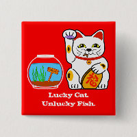 Chat chanceux. Poissons malheureux
