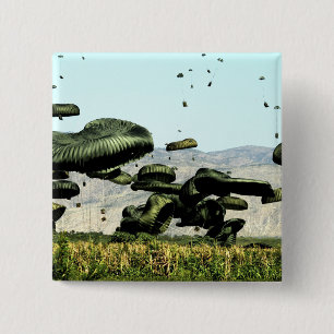 Badge Carré 5 Cm Des paquets de nourriture et d'eau sont livrés par