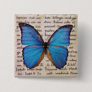 Badge Carré 5 Cm Papillon bleu Morpho sur la page du livre