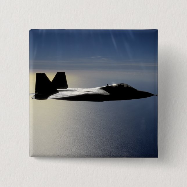 Badge Carré 5 Cm Un F/A-22 Raptor effectue une mission d'entraîneme (Devant)