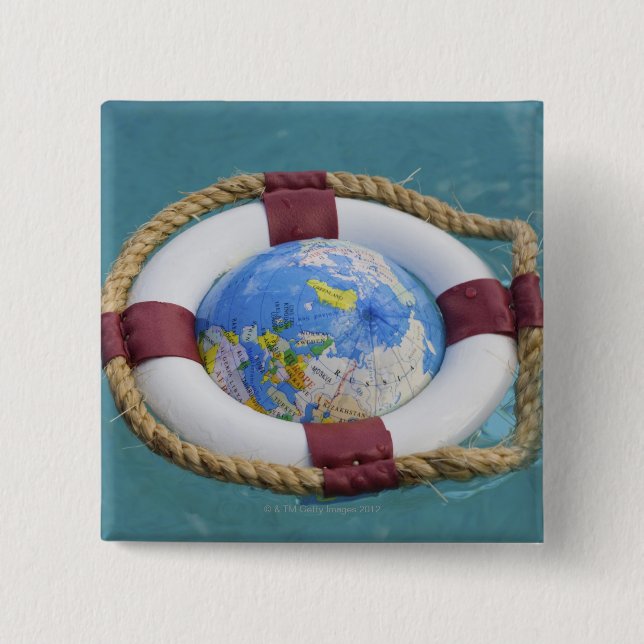 Badge Carré 5 Cm Un globe terrestre flottant (Devant)