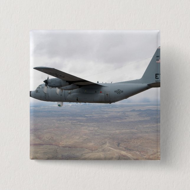 Badge Carré 5 Cm Un Hercules C-130 s'envole dans le ciel (Devant)