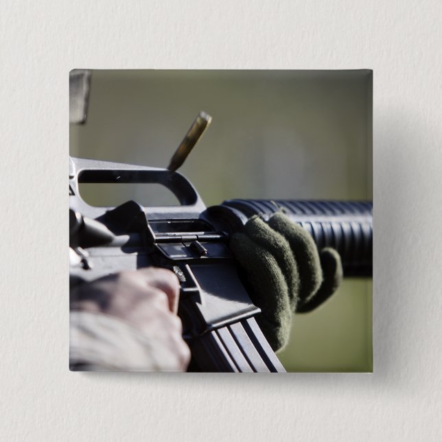 Badge Carré 5 Cm Une mouche ronde de la chambre d'un M-16A2 (Devant)