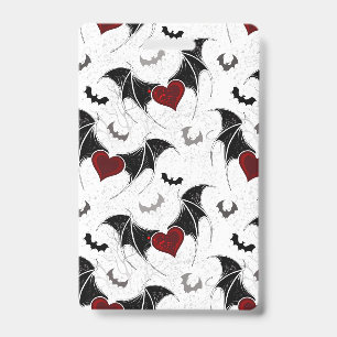 Badge Coeur d'Halloween avec ailes de chauve-souris noir
