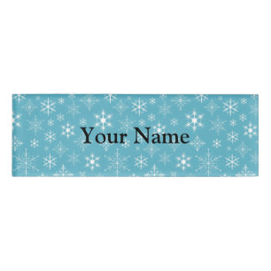 Badge D'identification Flocons de neige sur l'arrière - plan bleu