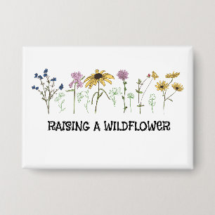 Badge Maman faisant pousser une fleur sauvage