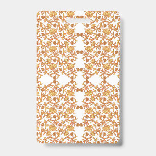 Badge Modèle floral symétrique avec motif orange