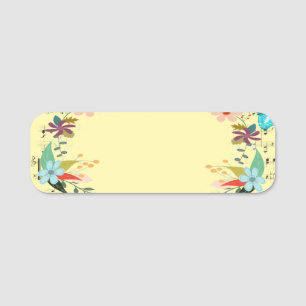 Badge nominatif à personnaliser avec un design flo