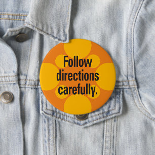 Badge Rond 10 Cm Suivez les instructions avec soin Orange Spots