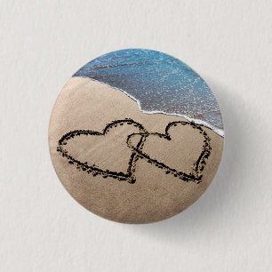 Badge Rond 2,50 Cm Deux coeurs dans le sable