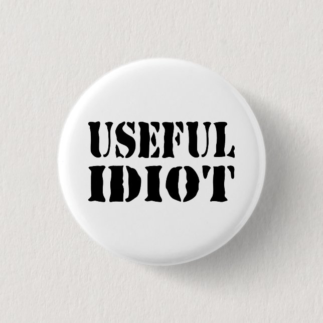 BADGE ROND 2,50 CM IDIOT UTILE (Devant)