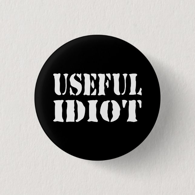 BADGE ROND 2,50 CM IDIOT UTILE (Devant)