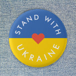 Badge Rond 2,50 Cm Situation en Ukraine<br><div class="desc">"Stand with Ukraine" collection to show solidarity and support anti-protests against the war in Ukraine. Le design a simple red heart over a Ukrainian Flag background in national colors of blue and yellow. I will donate 100% of my commission earned on this product range to support the efforts en Ukraine...</div>
