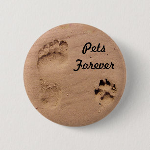Badge Rond 5 Cm Animal familier et empreinte de pas dans le sable