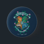 Badge Rond 5 Cm HOGWARTS™ Floral Crest<br><div class="desc">HARRY POTTER™ | Découvrez cette illustration florale de la crête HOGWARTS™ !</div>