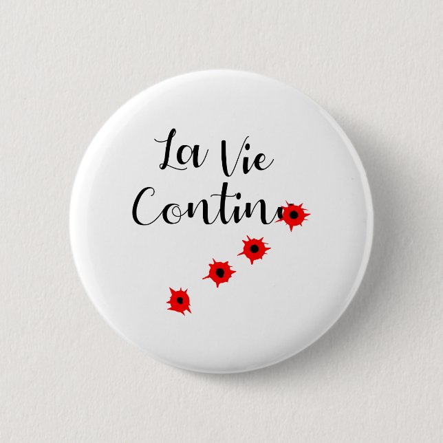BADGE ROND 5 CM LA VIE CONTINUE (Devant)