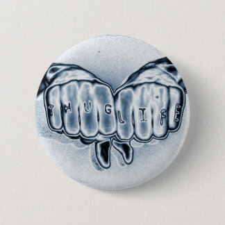 BADGE ROND 5 CM LA VIE DE VOYOU DE METTALIC