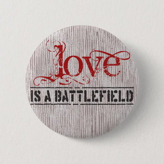 BADGE ROND 5 CM L'AMOUR EST UN CHAMP DE BATAILLE