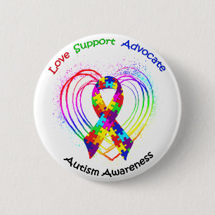 Badge Rond 5 Cm Le Ruban de l'autisme sur le coeur :