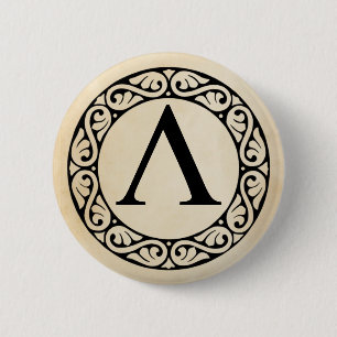 BADGE ROND 5 CM LETTRE GRECQUE ALPHABÈTE LABDA