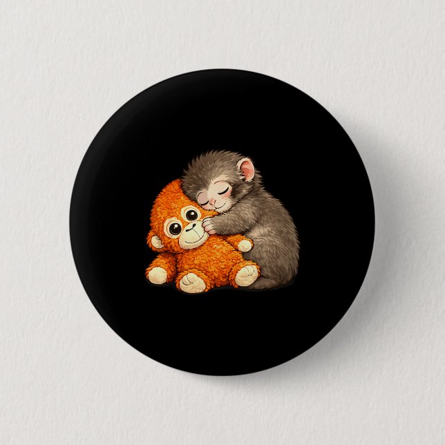 Badge Rond 5 Cm Mème de singe câlinant une peluche en train de se  (Devant)