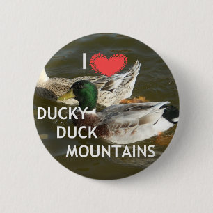 Badge Rond 5 Cm Montagnes de canard Ducky.