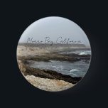 Badge Rond 5 Cm Morro Bay California Coastal Photography<br><div class="desc">A foggy overcast day in Morro Bay California with the ocean waves hitting the rocks on the shore in this beach photograph souvenir. This seaside travel photo keepsake button features black cursive script above the beach rocks and grey sky.</div>