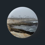 Badge Rond 5 Cm Morro Bay California Coastal Photography<br><div class="desc">A foggy overcast day in Morro Bay California with the ocean waves hitting the rocks on the shore in this beach photograph souvenir. This seaside travel photo keepsake button features black cursive script above the beach rocks and grey sky.</div>