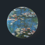 Badge Rond 5 Cm Nénuphars de Claude Monet, Impressionnisme Vintage<br><div class="desc">Nénuphar (1914) de Claude Monet est une peinture de nature impressionniste vintage. Une des nombreuses variations de peintures florales de nénuphars que Monet peint par l'étang dans son jardin fleuri à Giverny, France. À propos de l'artiste : Claude Monet (1840-1926) est un fondateur du mouvement de peinture impressionniste française, dont...</div>