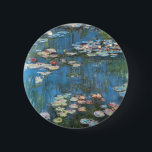 Badge Rond 5 Cm Nénuphars de Claude Monet, Impressionnisme Vintage<br><div class="desc">Nénuphar (1914) de Claude Monet est une peinture de nature impressionniste vintage. Une des nombreuses variations de peintures florales de nénuphars que Monet peint par l'étang dans son jardin fleuri à Giverny, France. À propos de l'artiste : Claude Monet (1840-1926) est un fondateur du mouvement de peinture impressionniste française, dont...</div>
