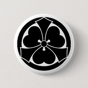 Badge Rond 5 Cm Oxalis avec des épées saillantes en cercle