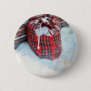 Badge Rond 5 Cm Sac du Père Noël dans la neige