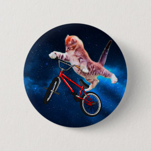 Badge Rond 5 Cm Saut de chat sur un vélo