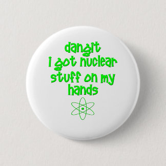 Badge Rond 5 Cm Substance nucléaire sur des mains