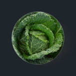Badge Rond 5 Cm Tête de choux bio frais<br><div class="desc">Doté d'une tête verte et vibrante de chou biologique,  idéal pour tout végétalien ou amateur de légumes.</div>