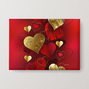 Badge Saint-Valentin dorés et rouges