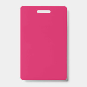Badge un arrière - plan rose avec une bordure blanche