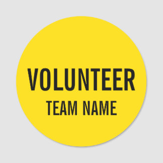Badge volontaire jaune avec nom d'équipe personnal