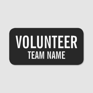 Badge volontaire noir avec nom d'équipe personnali